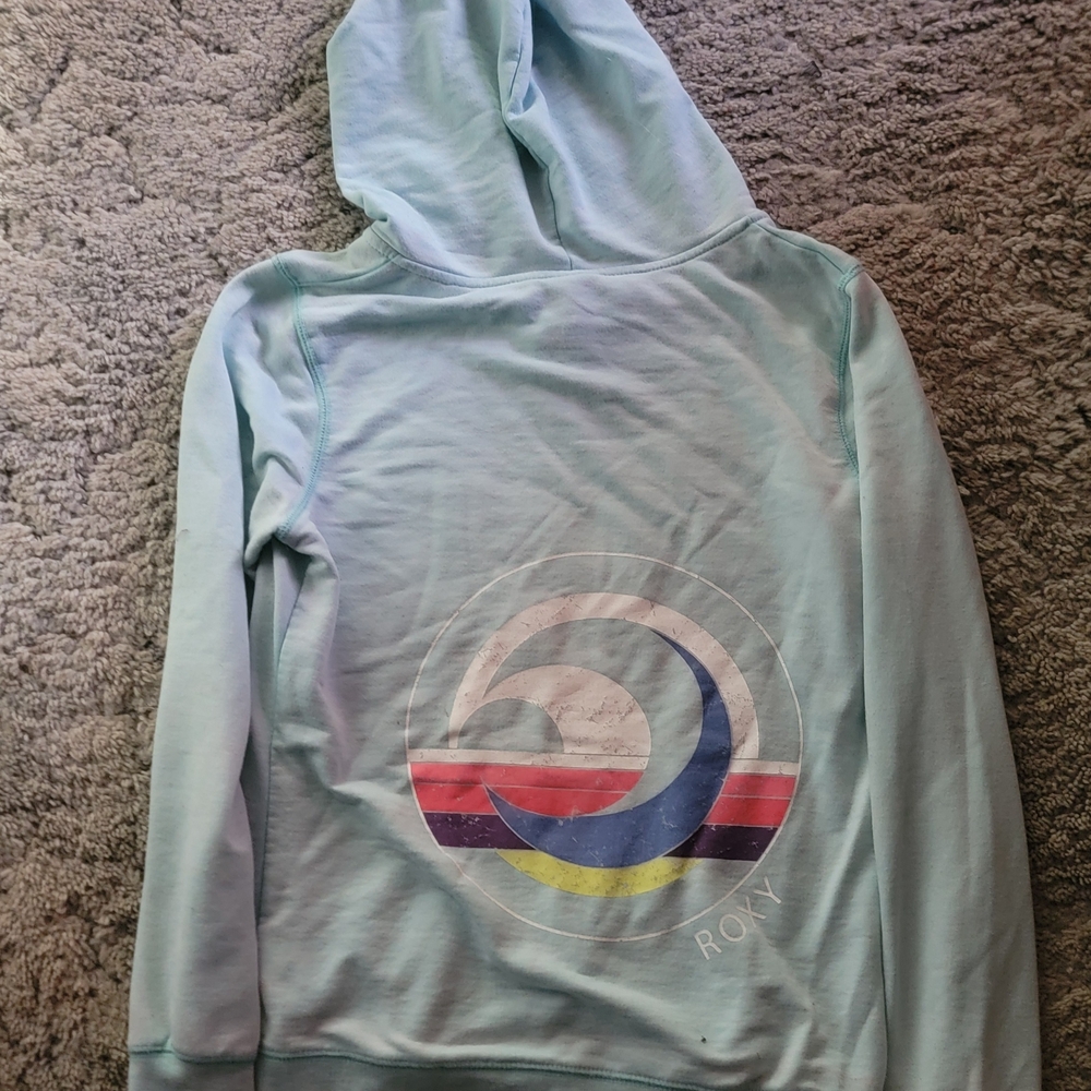 Vintage Roxy Light Blue Hoodie with Wave Graphic
